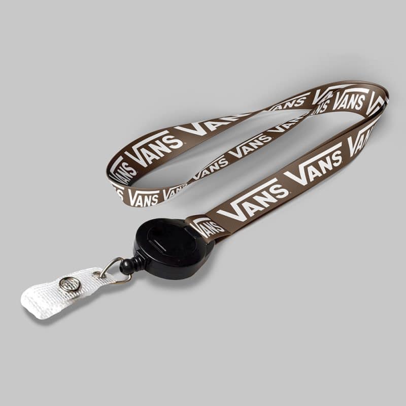 1" Brown custom lanyard printed with company logo with Black Badge Reel attachment 1"