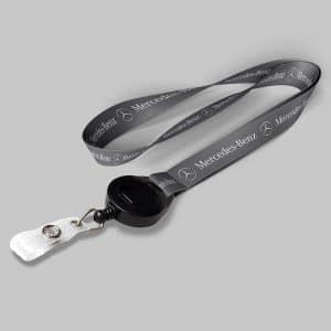 1/2" Charcoal custom lanyard printed with company logo with Black Badge Reel attachment 0.50"