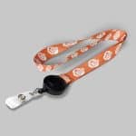 3/4" Light Orange custom lanyard printed with company logo with Black Badge Reel attachment 0.75"